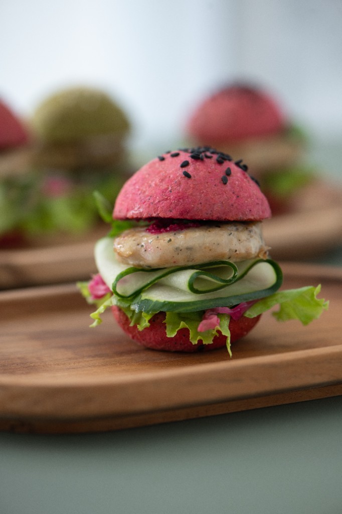 Colourful buns with chicken, cucumber and lettuce
