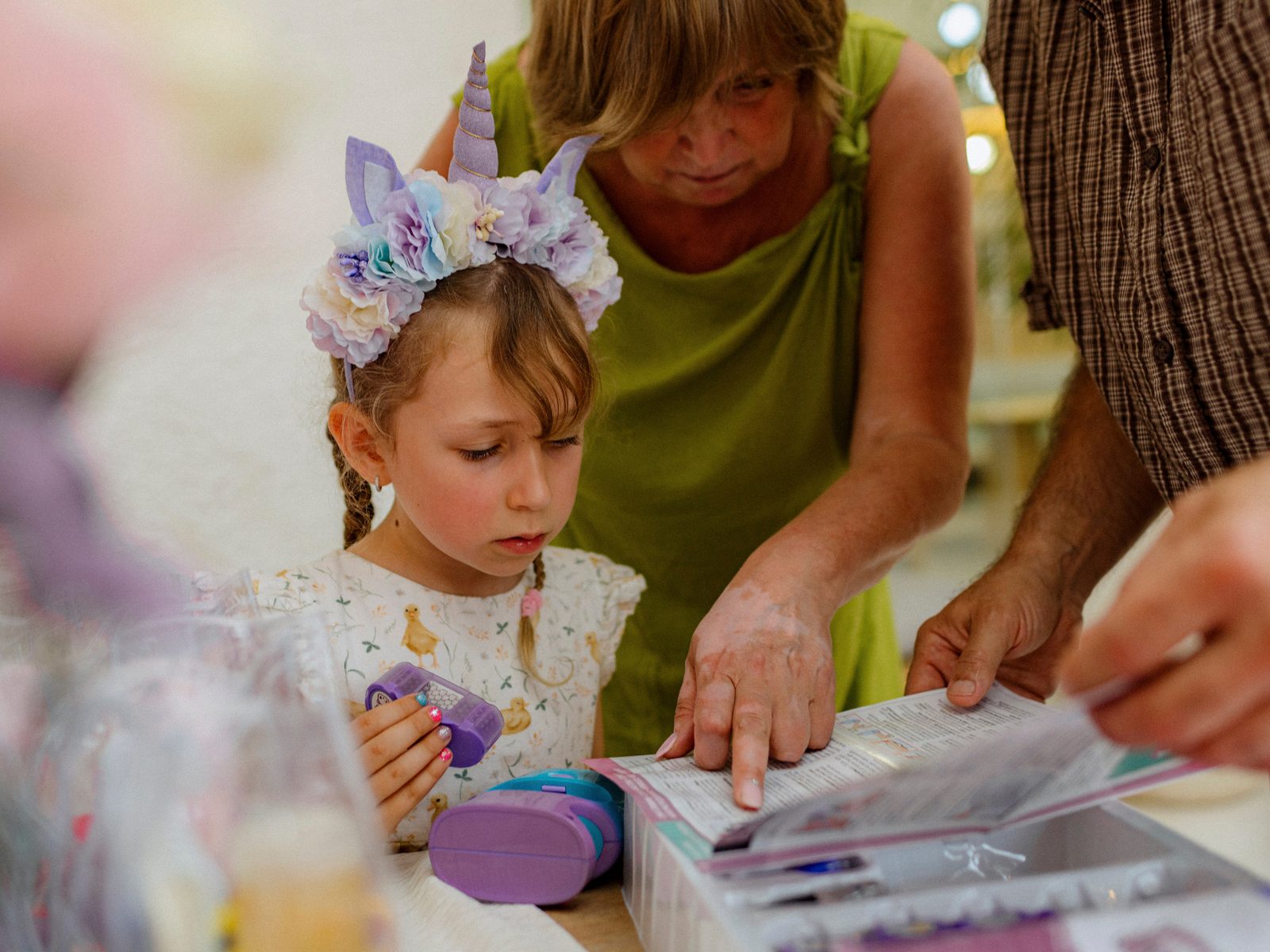 Children making crafts at the table