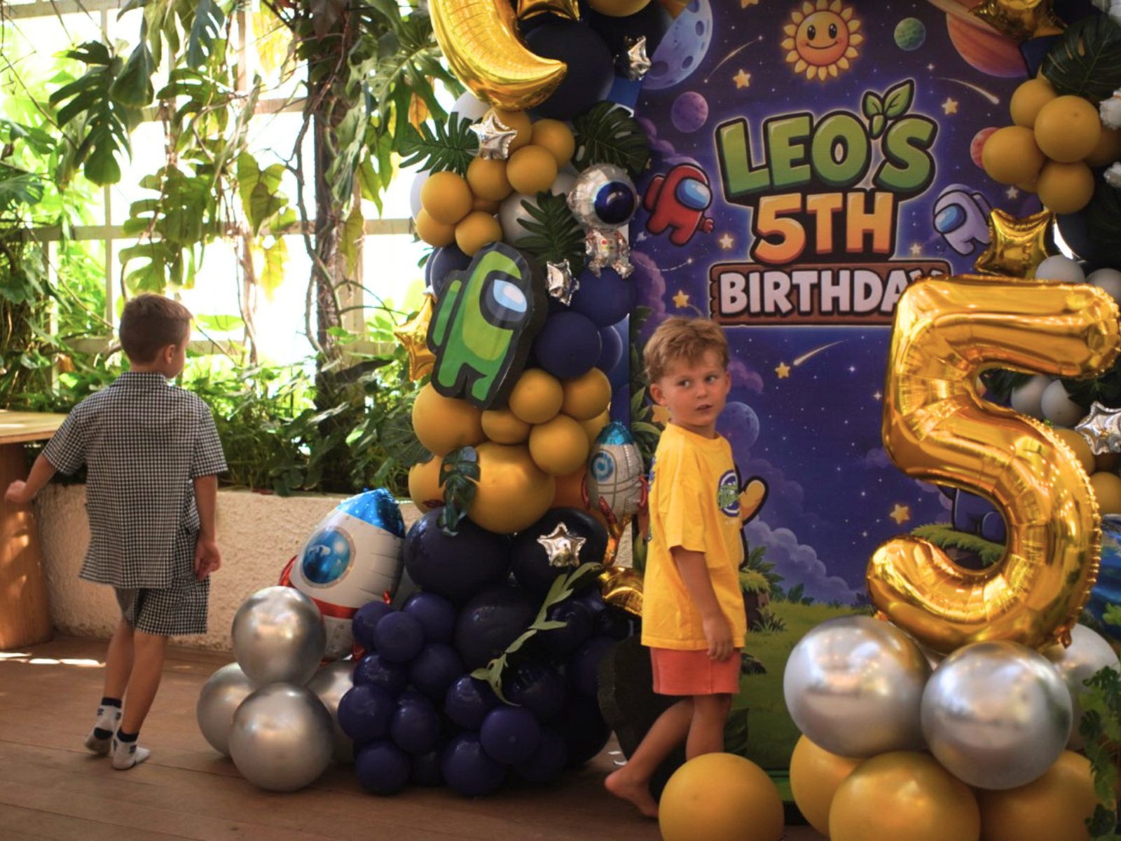 Themed birthday balloon backdrop