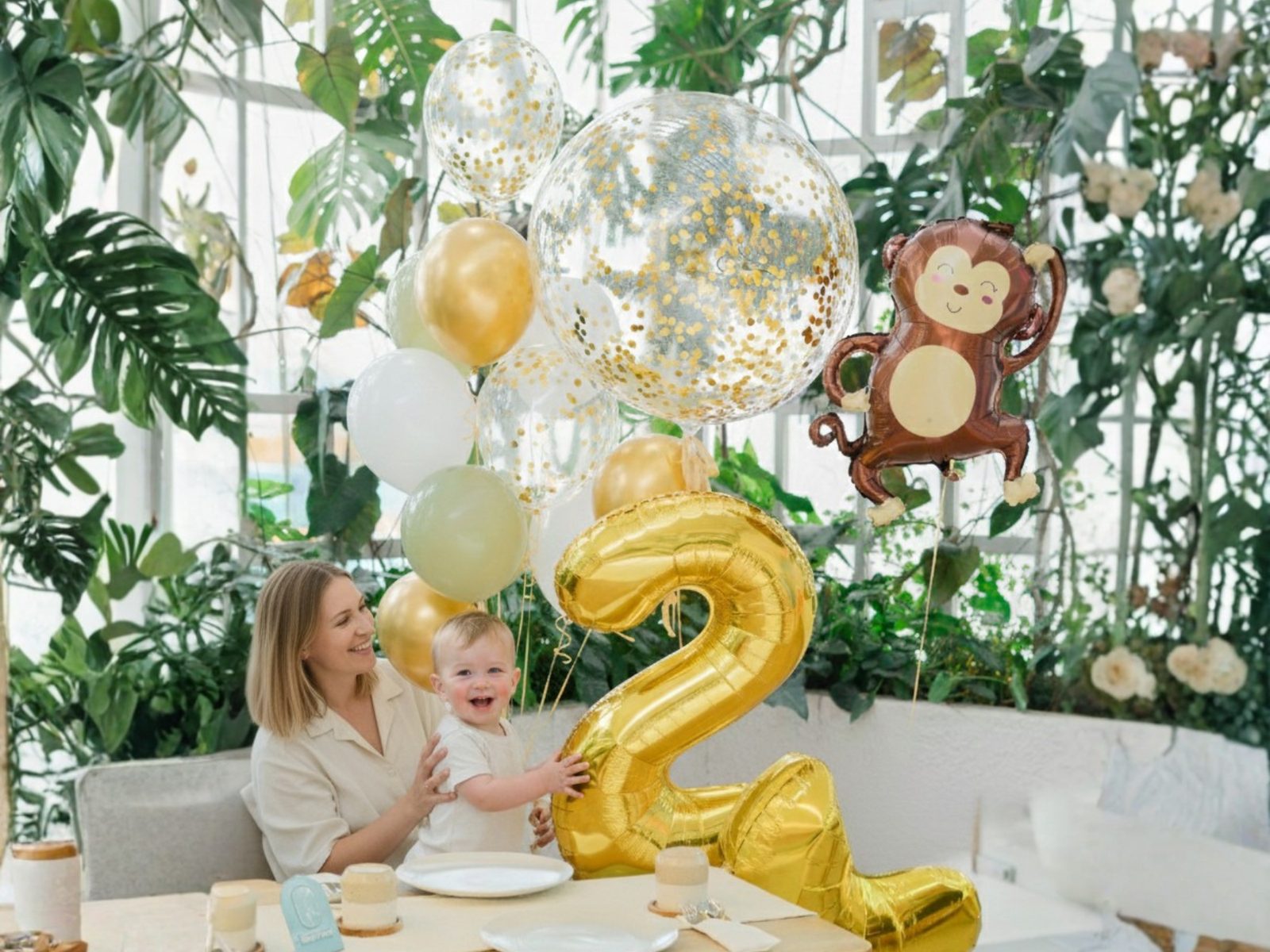Birthday table with balloons and cake